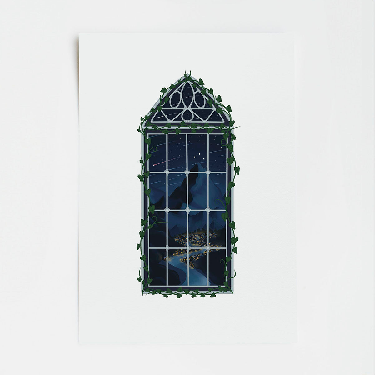 Decorative window mirror with gothic design on a white background